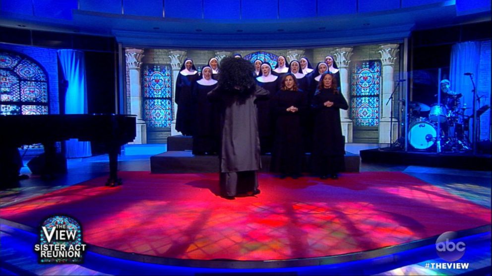 PHOTO: Whoopi Goldberg sings, Sept. 14, 2017, on "The View" with the "nuns" from the 1992 film, "Sister Act."