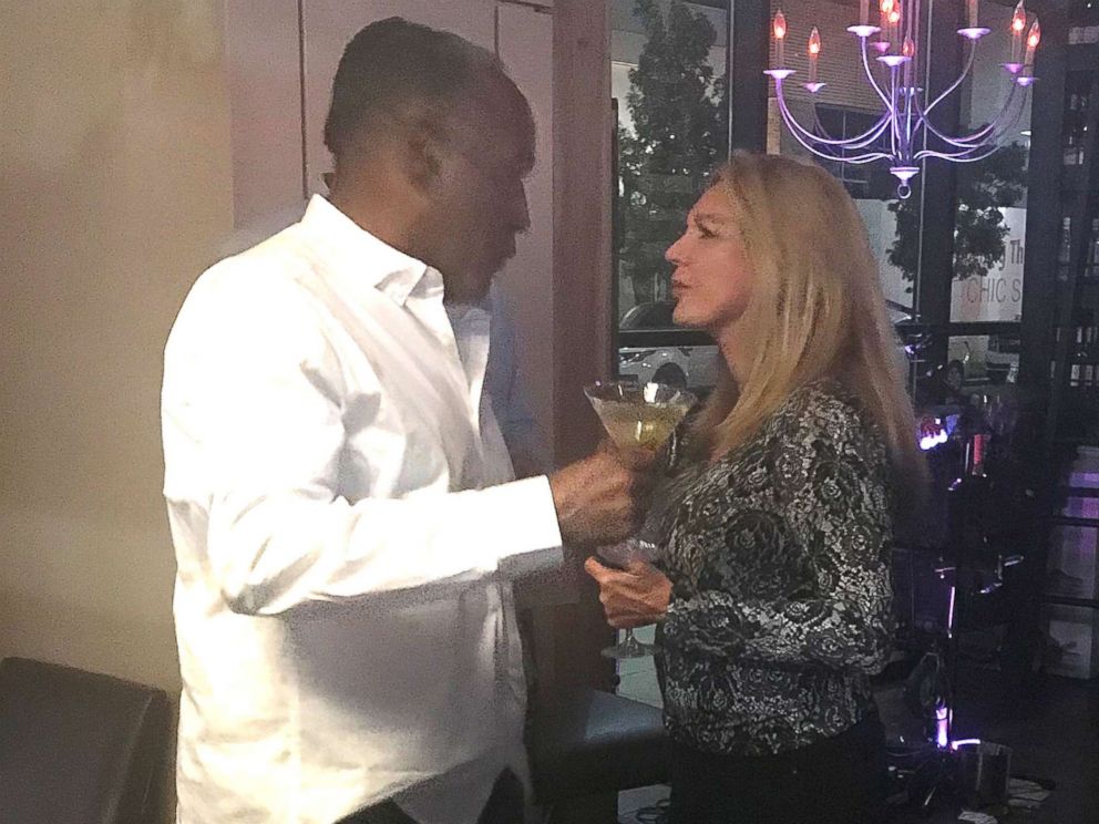 PHOTO: O.J. Simpson holding a martini glass at Grape Street Wine Bar and Cellar on Oct. 13.