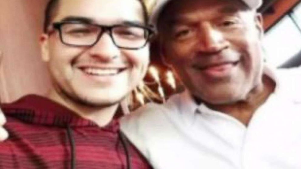 O.J. Simpson poses with Las Vegas fans on Sunday