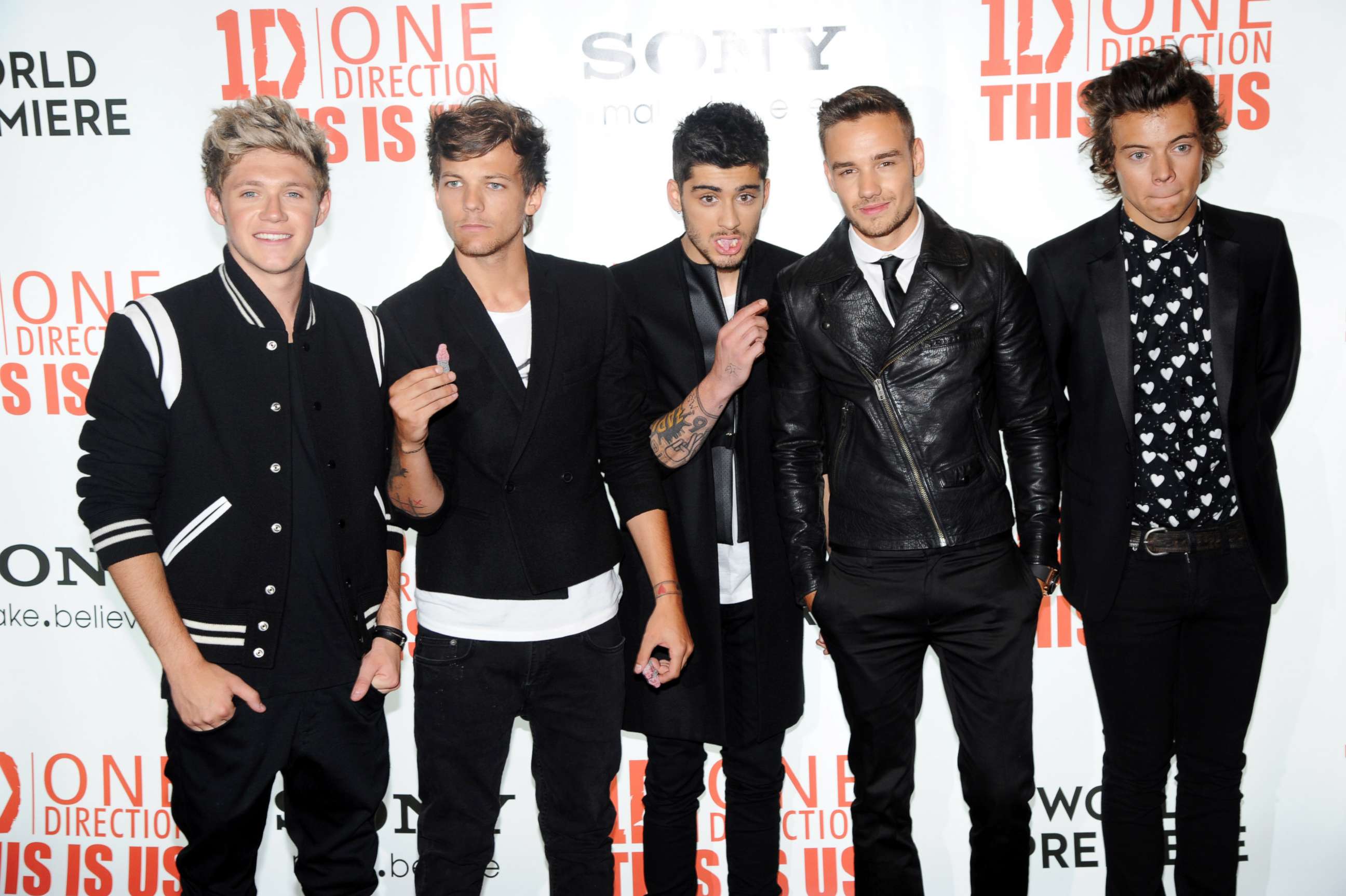 PHOTO: (L-R) Niall Horan, Louis Tomlinson, Zayn Malik, Liam Payne and Harry Styles of One Direction attend the world premiere of 'One Direction - This Is Us' at The Empire Leicester Square, Aug.t 20, 2013 in London.