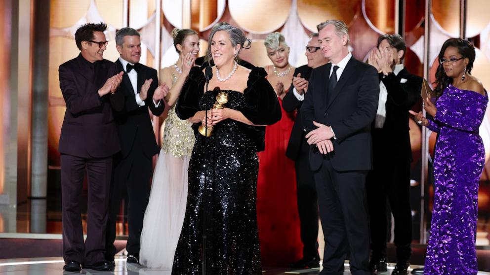 PHOTO: Emma Thomas accepts the award for Best Motion Picture  Drama for "Oppenheimer" at the 81st Golden Globe Awards, Jan. 7, 2024 in Beverly Hills.