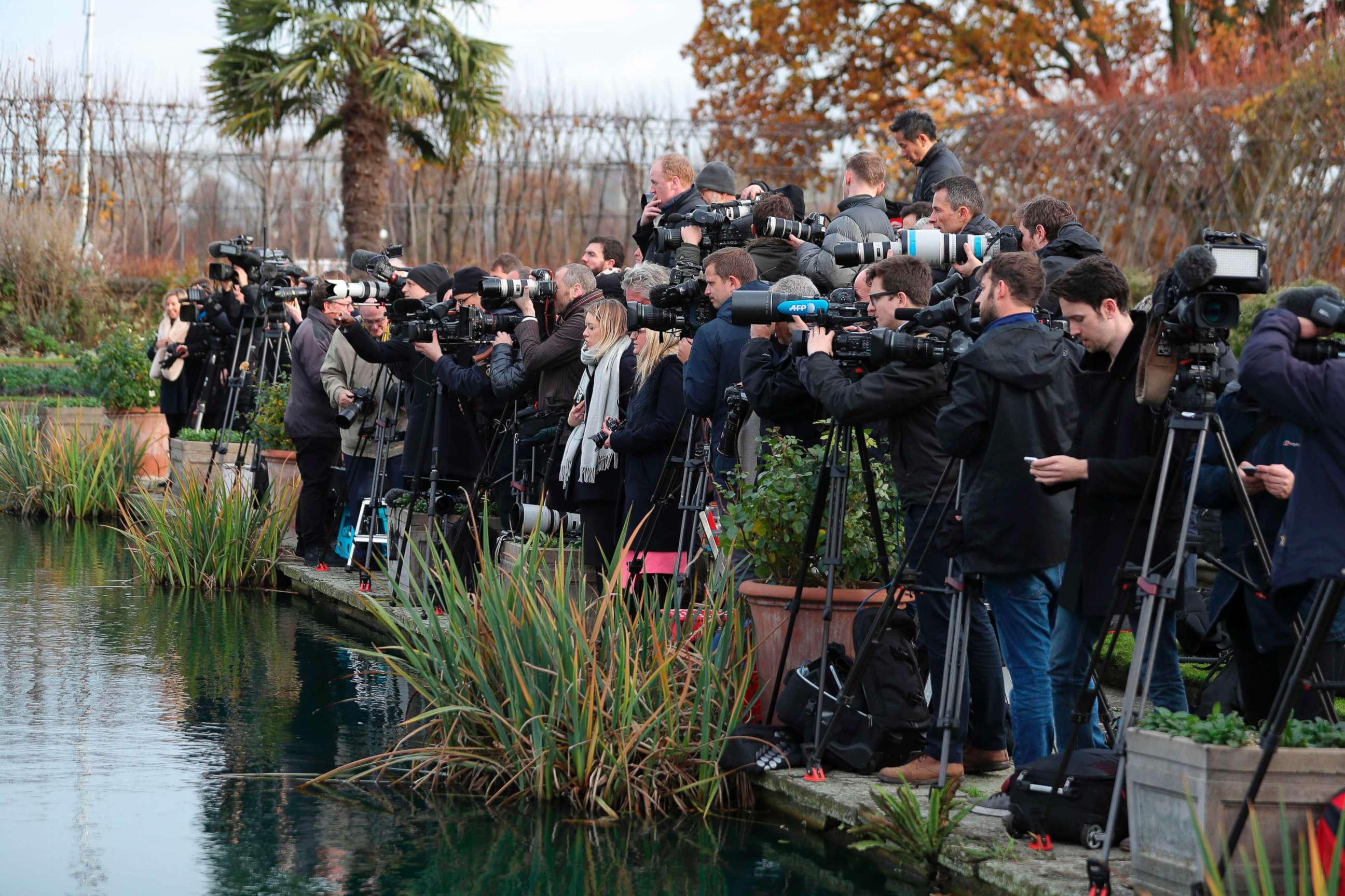PHOTO: Members of the media gather in the Sunken Garden at Kensington Palace in west London, Nov. 27, 2017, as they wait for Britain's Prince Harry and his fiance, U.S. actress Meghan Markle to pose for a photograph.