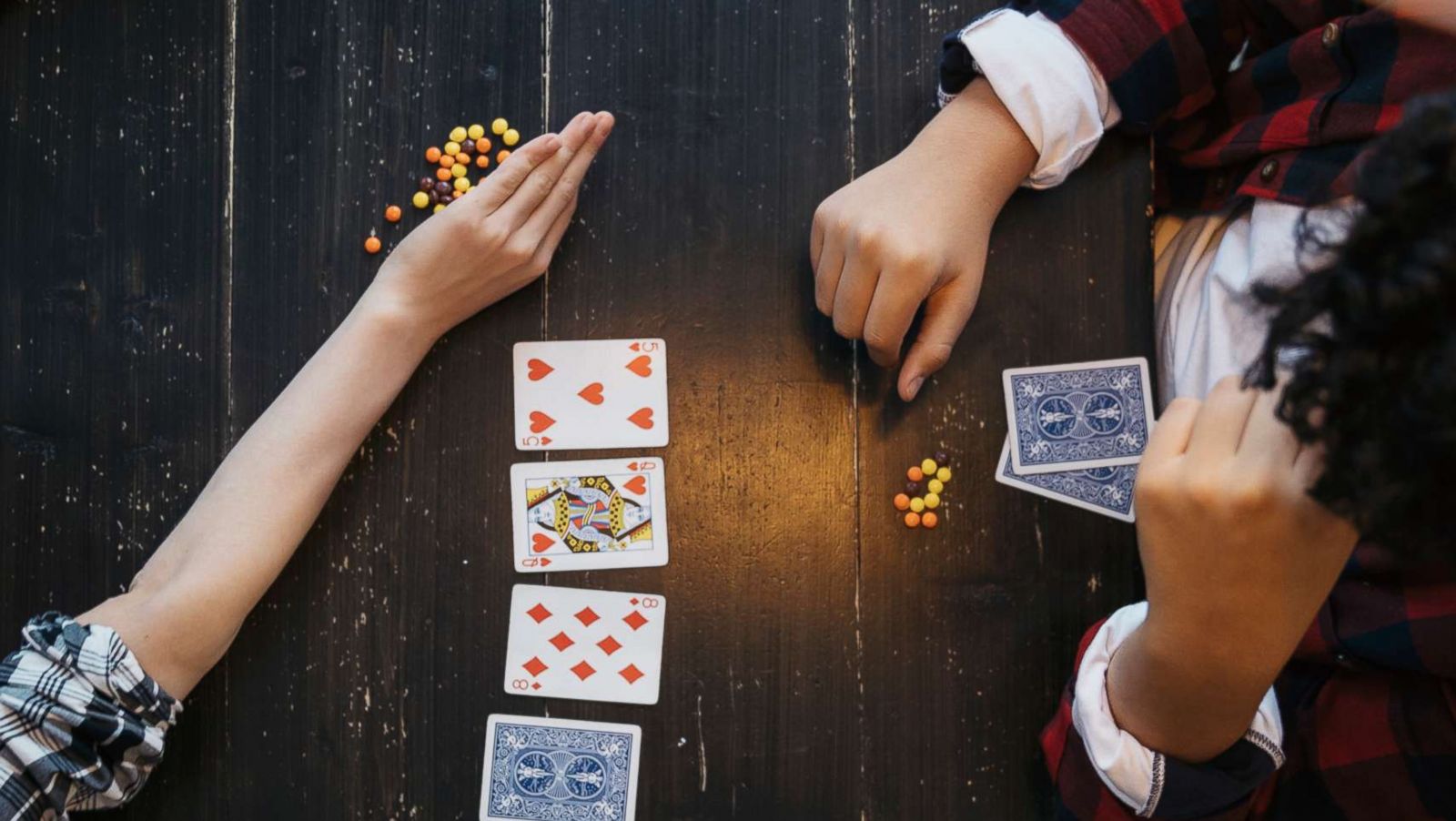 PHOTO: Friends play a card game in this undated stock photo.