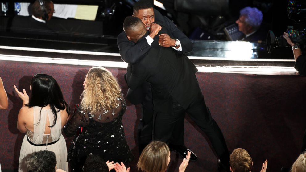 PHOTO: "Moonlight" castmembers Mahershala Ali and Trevante Rhodes hug after it was announced that the movie won Best Picture during the telecast of the 89th Academy Awards on Feb. 26, 2017 in Hollywood, Calif.