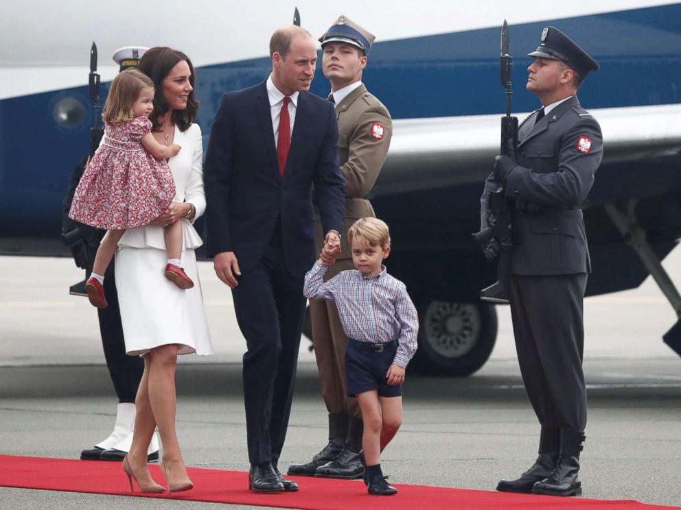 PHOTO: Prince William and his wife Catherine, The Duchess of Cambridge, with their children Prince George and Princess Charlotte arrive in Warsaw, Poland, July 17, 2017.