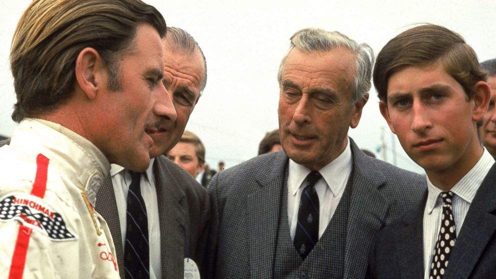 PHOTO: British race car driver Graham Hill talks with Lord Louis Mountbatten and Prince Charles, Prince of Wales, Jan. 1970. 