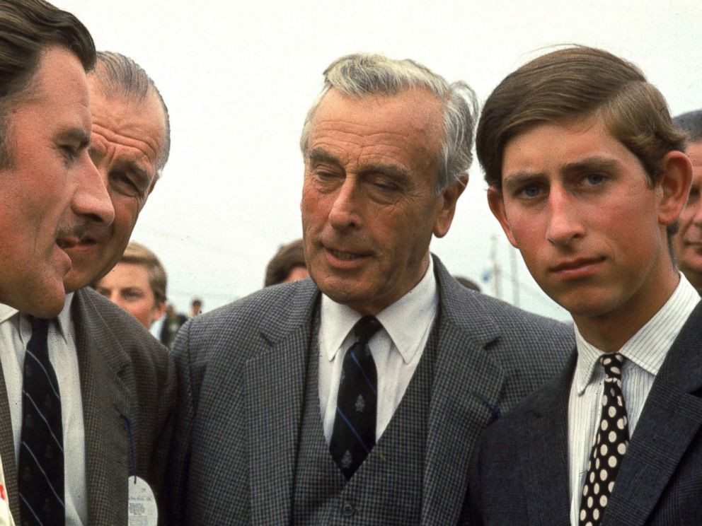 PHOTO: British race car driver Graham Hill talks with Lord Louis Mountbatten and Prince Charles, Prince of Wales, Jan. 1970.