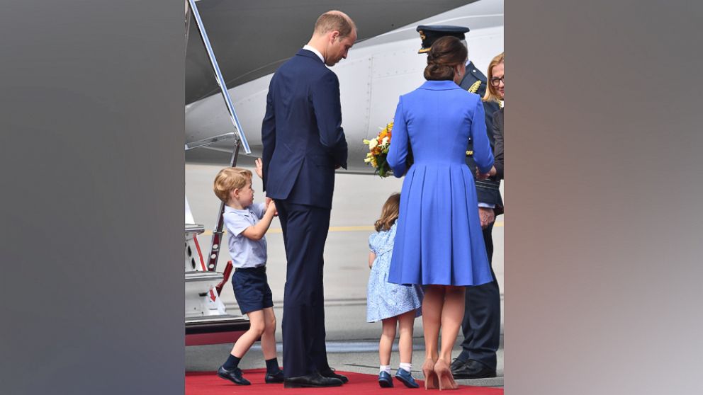 PHOTO: Prince William, Catherine The Duchess of Cambridge with their children Prince George and Princess Charlotte depart Warsaw airport in Poland after a three day visit, July 19, 2017.