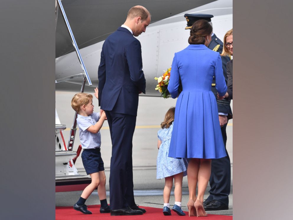 PHOTO: Prince William, Catherine The Duchess of Cambridge with their children Prince George and Princess Charlotte depart Warsaw airport in Poland after a three day visit, July 19, 2017.