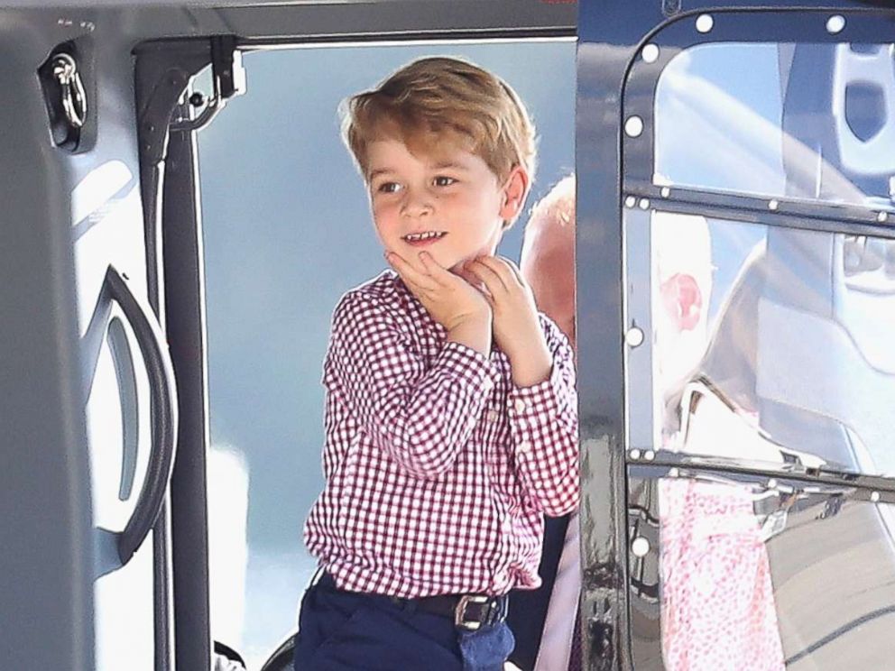 PHOTO: Prince George of Cambridge view helicopter models H145 and H135 before departing from Hamburg airport on the last day of their official visit to Poland and Germany, July 21, 2017 in Hamburg, Germany.