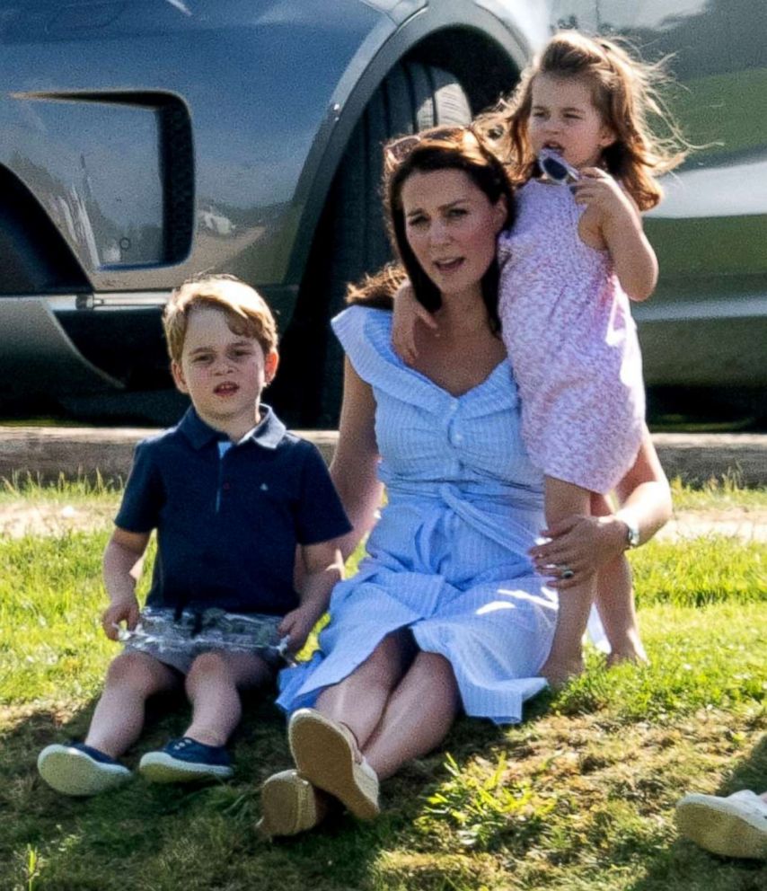 PHOTO: Catherine The Duchess of Cambridge, Prince George of Cambridge and Princess Charlotte of Cambridge at the Beaufort Polo Club in Tetbury, Gloucestershire, England, UK., June 10, 2018.