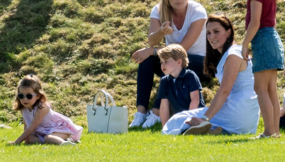PHOTO: Princess Charlotte of Cambridge, Prince George of Cambridge and  Catherine The Duchess of Cambridge  at the Beaufort Polo Club in Tetbury, Gloucestershire, England, June 10, 2018.