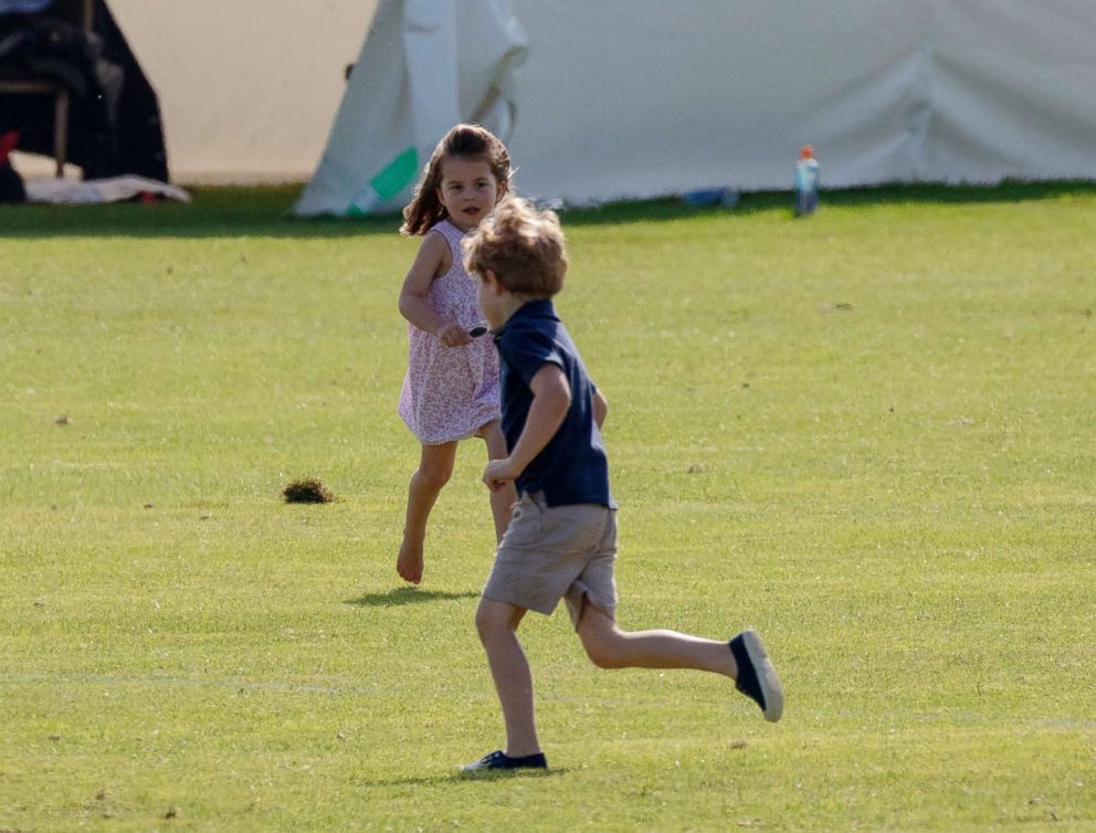 PHOTO: Prince George of Cambridge and Princess Charlotte of Cambridge at the Beaufort Polo Club in Tetbury, Gloucestershire, England, June 10, 2018.
