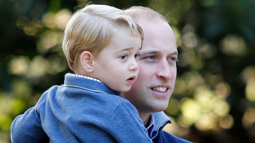 PHOTO: Britain's Prince William holds Prince George during a children's party at Government House in Victoria, British Columbia, Canada, Sept. 29, 2016.
