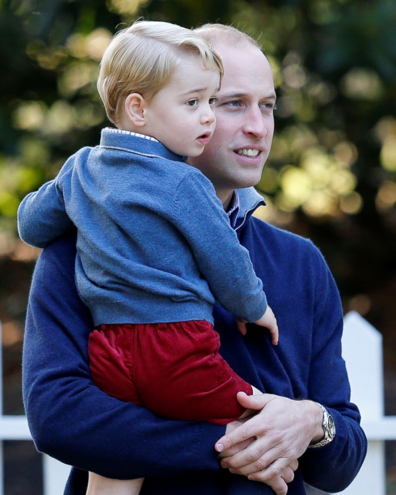 PHOTO: Britain's Prince William holds Prince George during a children's party at Government House in Victoria, British Columbia, Canada, Sept. 29, 2016.