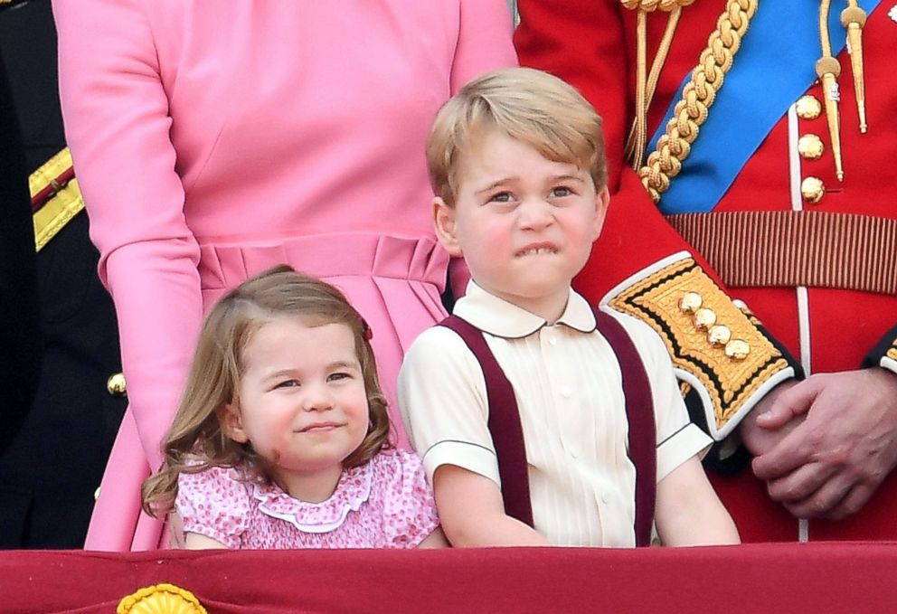 PHOTO: Princess Charlotte of Cambridge and Prince George of Cambridge look on from the balcony during the annual Trooping The Colour parade at the Mall on June 17, 2017 in London.