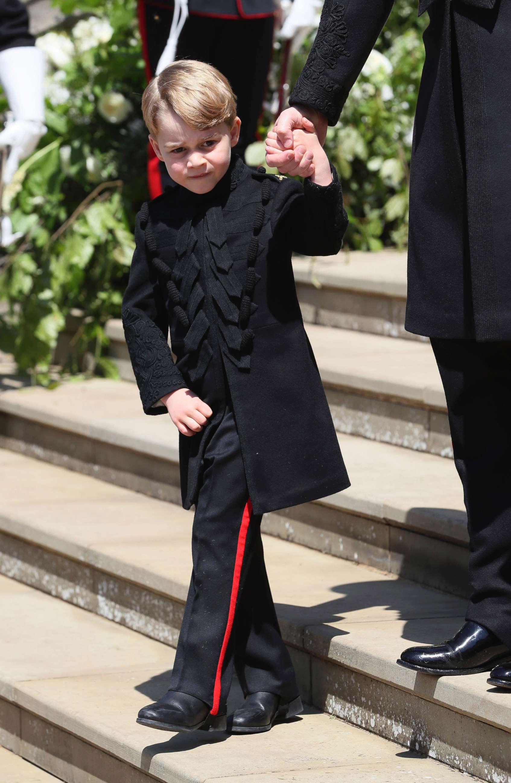 PHOTO: Britain's Prince George leaves after the wedding of Prince Harry and Meghan Markle at St. George's Chapel in Windsor Castle in Windsor, May 19, 2018.