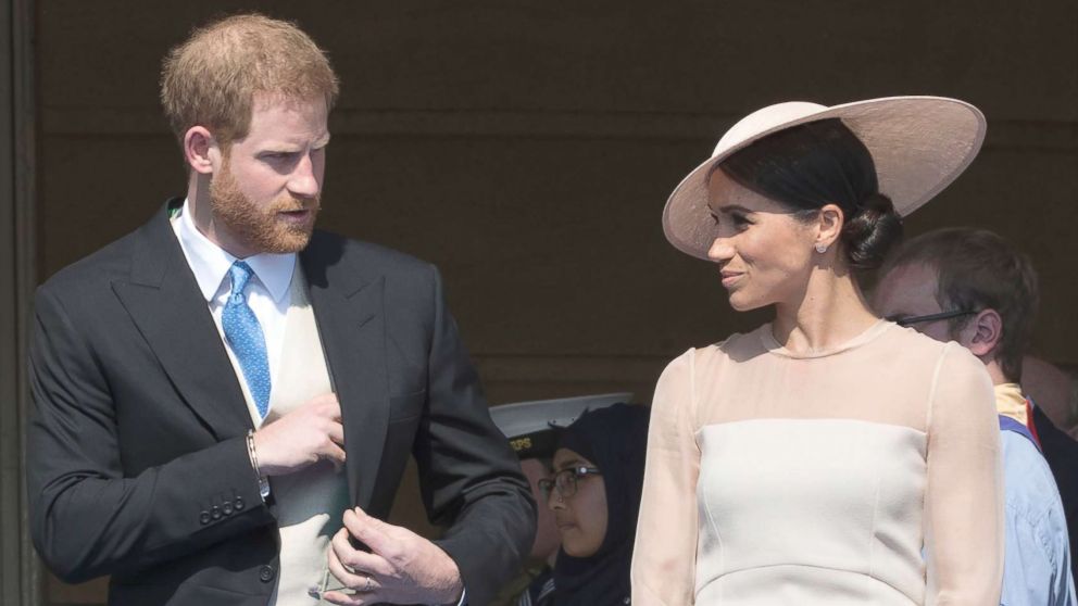 PHOTO: The Duke and Duchess of Sussex at the Prince of Wales' 70th Birthday Patronage Celebration in the gardens of Buckingham Palace in London, May 22, 2018.