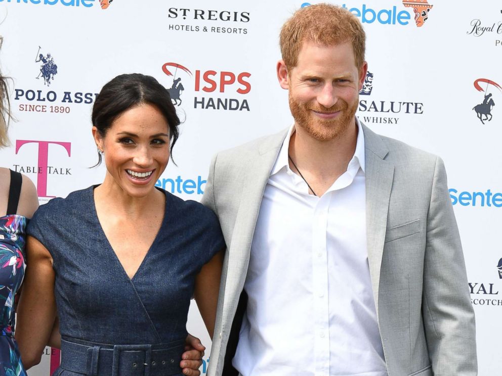 PHOTO: Meghan Duchess of Sussex and Prince Harry attend the Sentebale ISPS Handa Polo Cup, Berkshire Polo Club in Windsor, July 26, 2018.