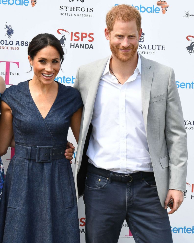 PHOTO: Meghan Duchess of Sussex and Prince Harry attend the Sentebale ISPS Handa Polo Cup, Berkshire Polo Club in Windsor, July 26, 2018.