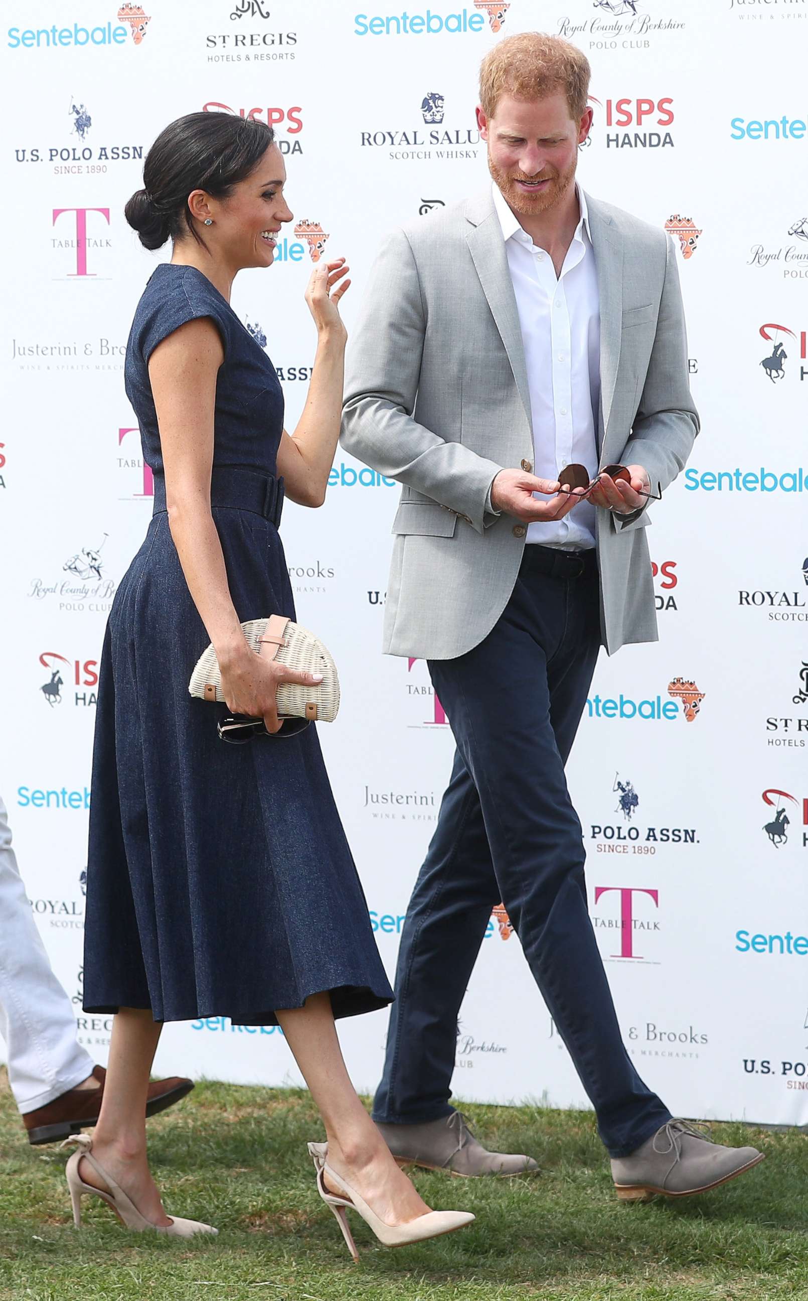 PHOTO: Britain's Prince Harry and Meghan the Duchess of Sussex arrive at a charity polo match in Windsor, July 26, 2018.