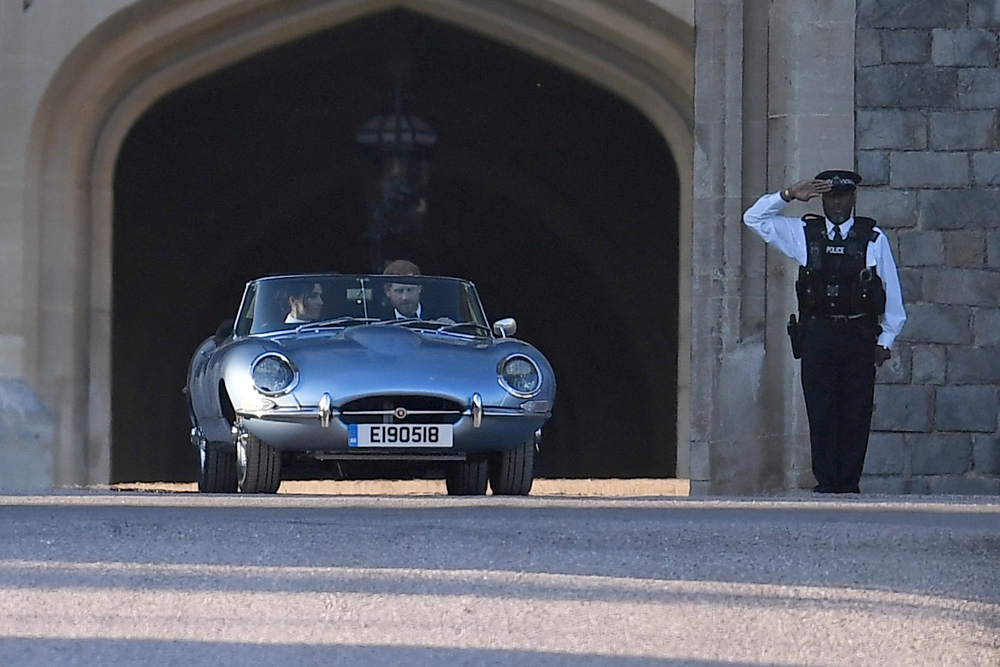 PHOTO: The newly married Duke and Duchess of Sussex, Prince Harry and Meghan Markle, leave Windsor Castle in a convertible car after their wedding in Windsor, England, to attend an evening reception at Frogmore House, May 19, 2018. 
