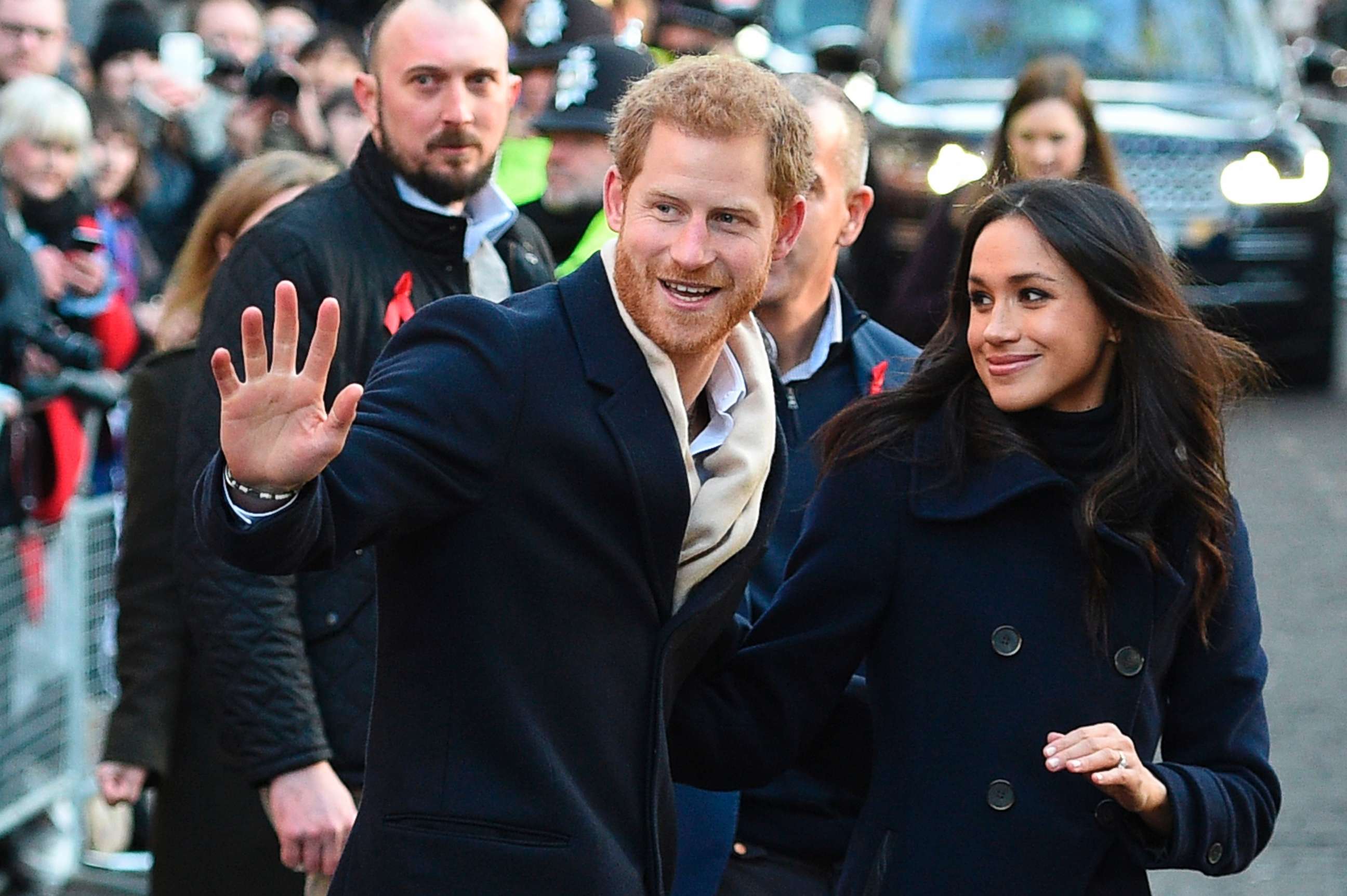 PHOTO: Britain's Prince Harry and his fiancee US actress Meghan Markle greet wellwishers on a walkabout as they arrive for an engagement at Nottingham Contemporary in Nottingham, England, Dec. 1, 2017.