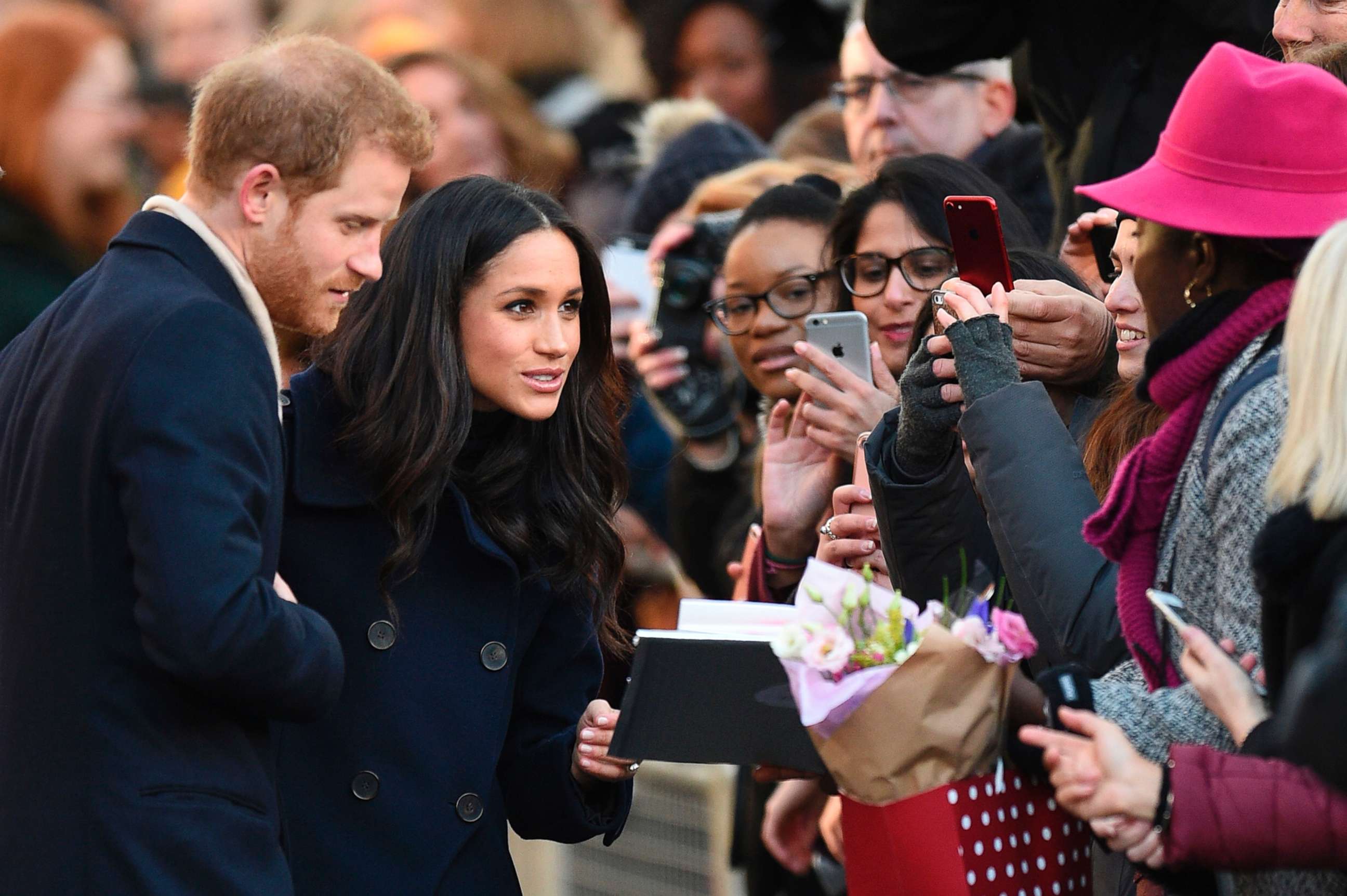 PHOTO: Britain's Prince Harry and his fiancee Meghan Markle greet well wishers as they arrive for the Terrence Higgins Trust World AIDS Day charity fair in Nottingham, England, Dec. 1, 2017. 