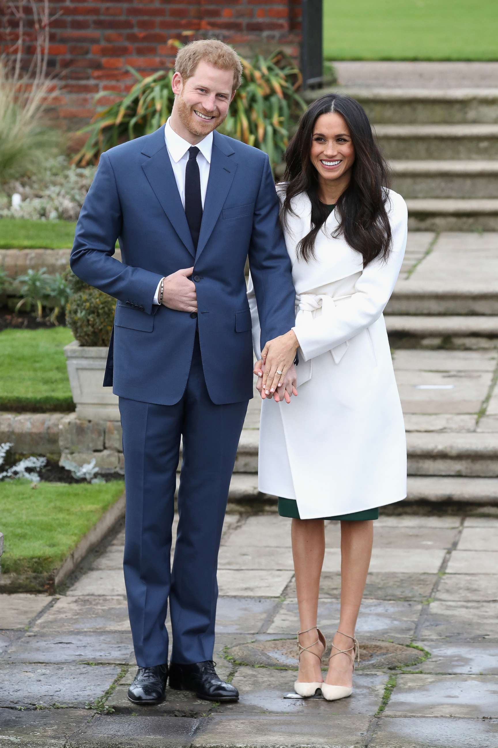 PHOTO: Prince Harry and Meghan Markle pose for photographers during the announcement of their engagement at the Sunken Gardens at Kensington Palace on Nov. 27, 2017 in London.