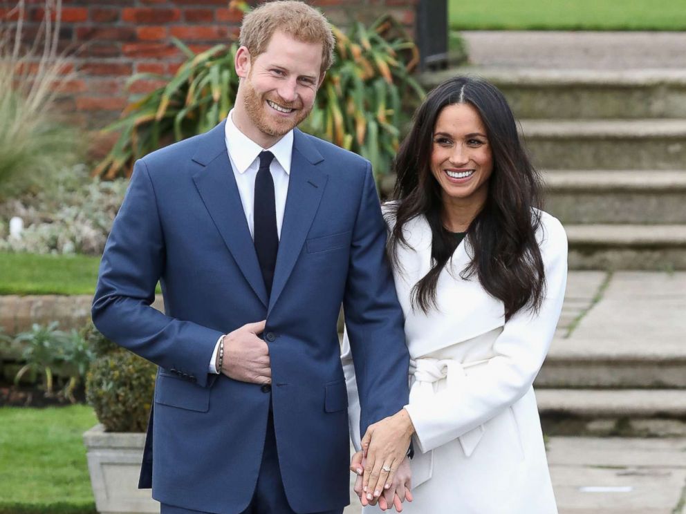 PHOTO: Prince Harry and Meghan Markle pose for photographers during the announcement of their engagement at the Sunken Gardens at Kensington Palace on Nov. 27, 2017 in London.