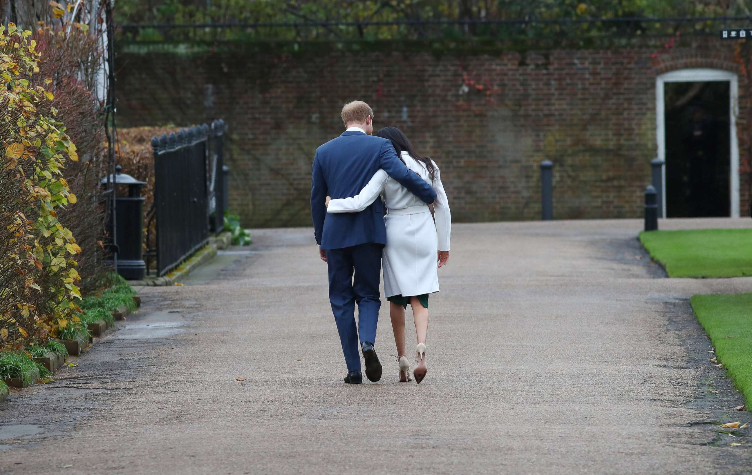 PHOTO: Britain's Prince Harry and Meghan Markle leave after a photocall after announcing their engagement in the Sunken Garden in Kensington Palace in London, Nov. 27, 2017.