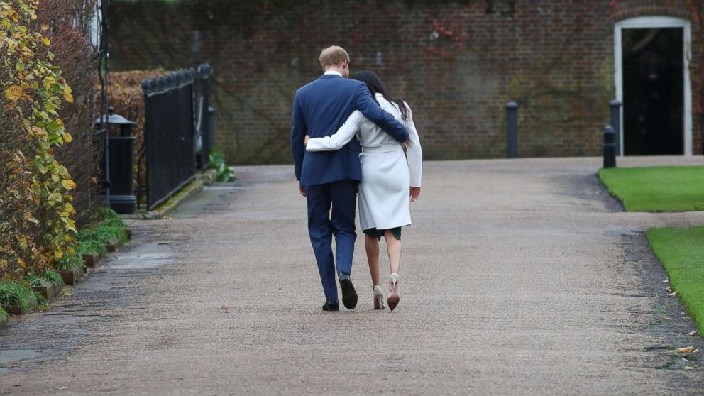 PHOTO: Britain's Prince Harry and Meghan Markle leave after a photocall after announcing their engagement in the Sunken Garden in Kensington Palace in London, Nov. 27, 2017.