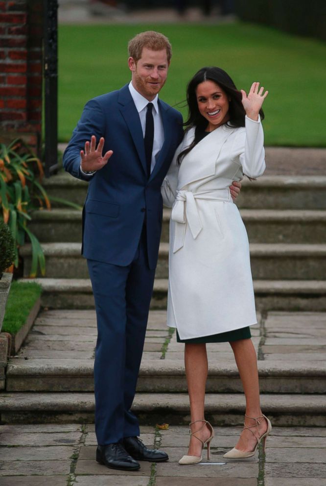 PHOTO: Britain's Prince Harry and his fiance U.S. actress Meghan Markle pose for a photograph in the Sunken Garden at Kensington Palace in west London, on Nov. 27, 2017, following the announcement of their engagement.