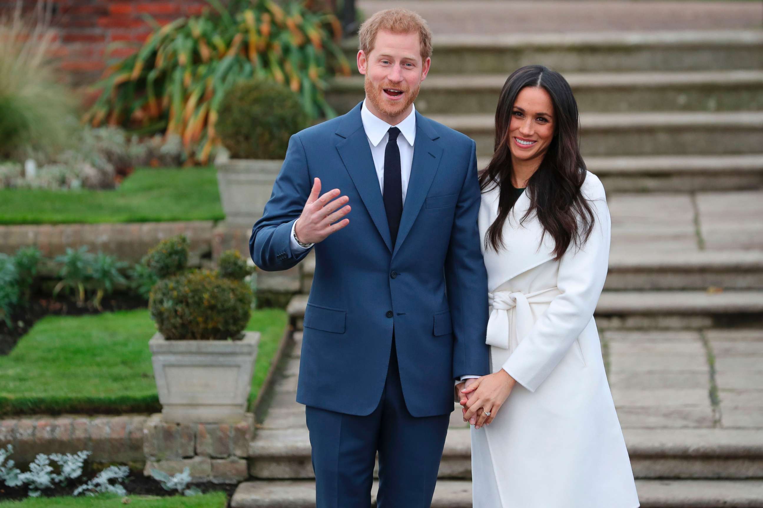 PHOTO: Britain's Prince Harry and his fiance U.S. actress Meghan Markle pose for a photograph in the Sunken Garden at Kensington Palace in west London, Nov. 27, 2017, following the announcement of their engagement.

