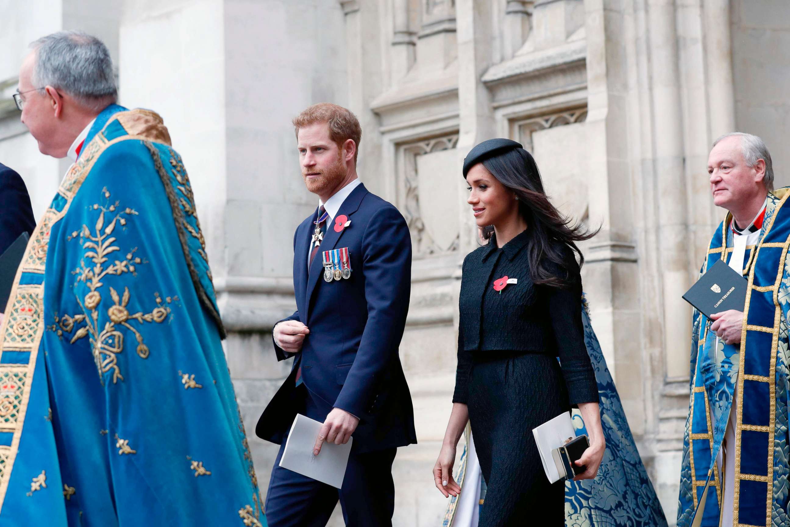 PHOTO: Britain's Prince Harry and his fiancee actress Meghan Markle leave after attending a service of commemoration and thanksgiving to mark Anzac Day in Westminster Abbey, April 25, 2018, in London.