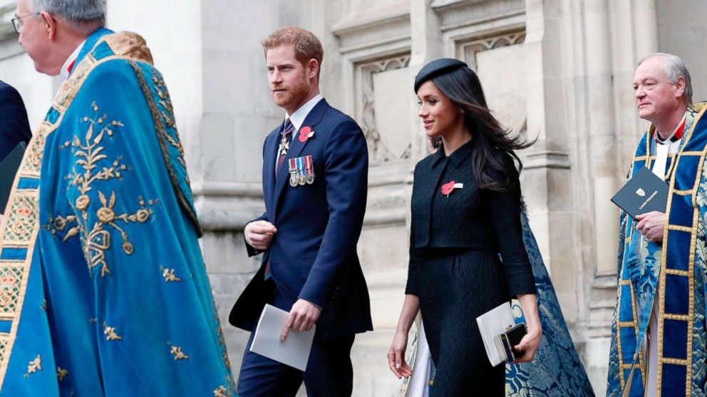 PHOTO: Britain's Prince Harry and his fiancee actress Meghan Markle leave after attending a service of commemoration and thanksgiving to mark Anzac Day in Westminster Abbey, April 25, 2018, in London.