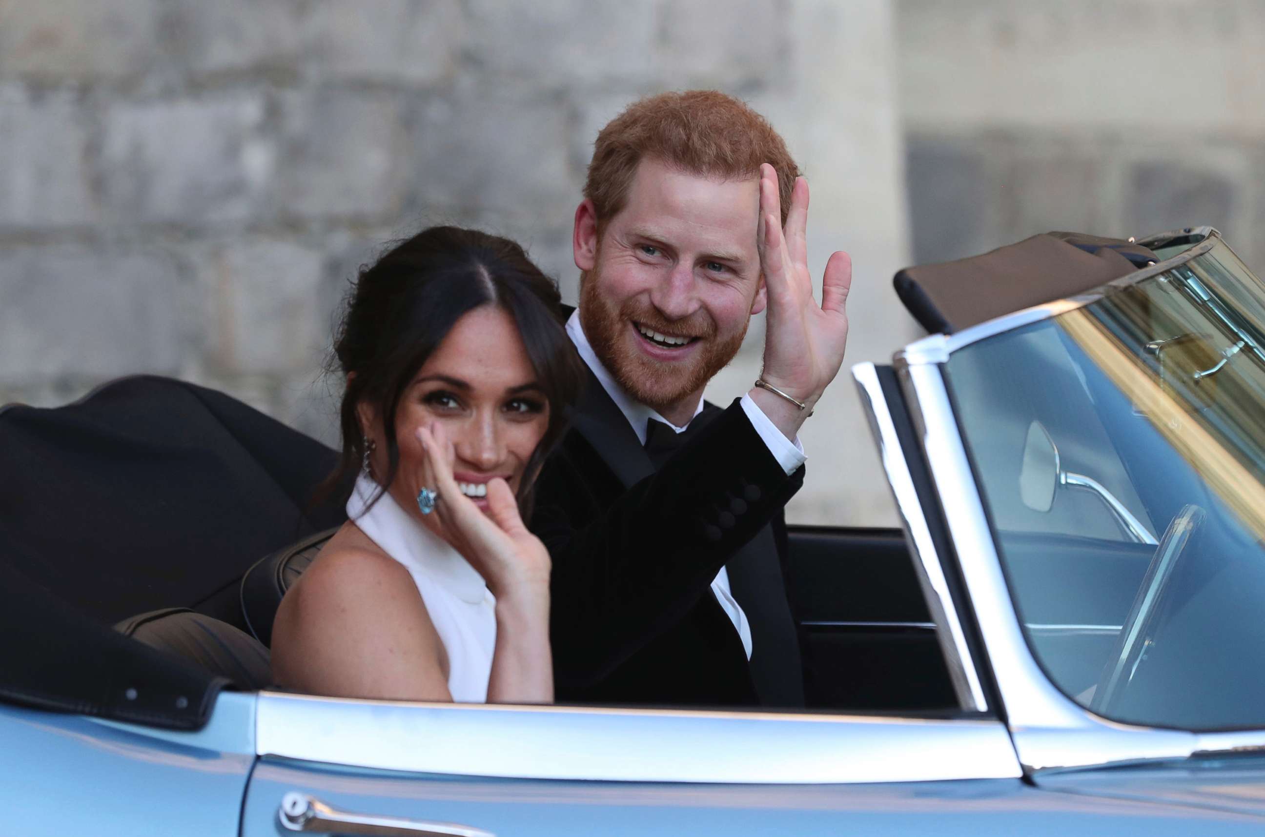 PHOTO: The newly married Duke and Duchess of Sussex, Prince Harry and Meghan Markle, leave Windsor Castle in a convertible car after their wedding in Windsor, England, to attend an evening reception at Frogmore House, May 19, 2018.
