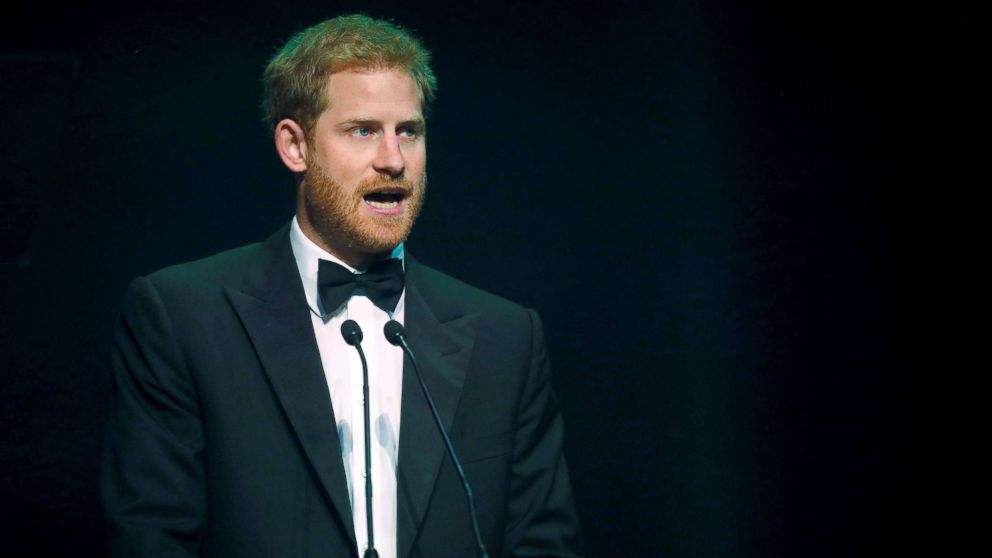 Prince Harry receives a posthumous Attitude Legacy Award on behalf of his mother Diana, Princess of Wales, at the Attitude Awards in London, Oct. 12, 2017.