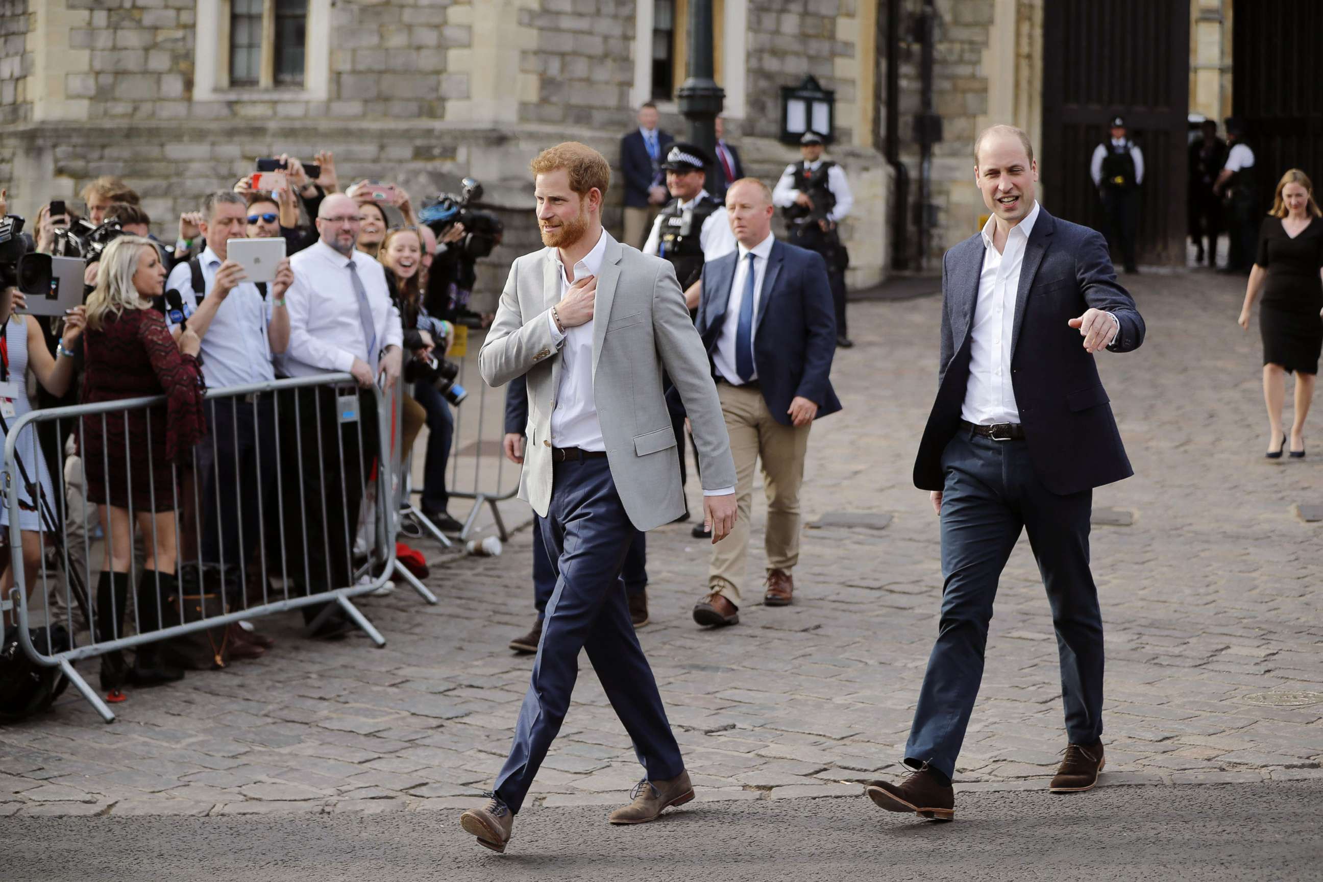 PHOTO: Prince Harry and his best man, Prince William, step out to greet well-wishers outside Windsor Castle, May 18, 2018, on the eve of Prince Harry's wedding, in Windsor, England.