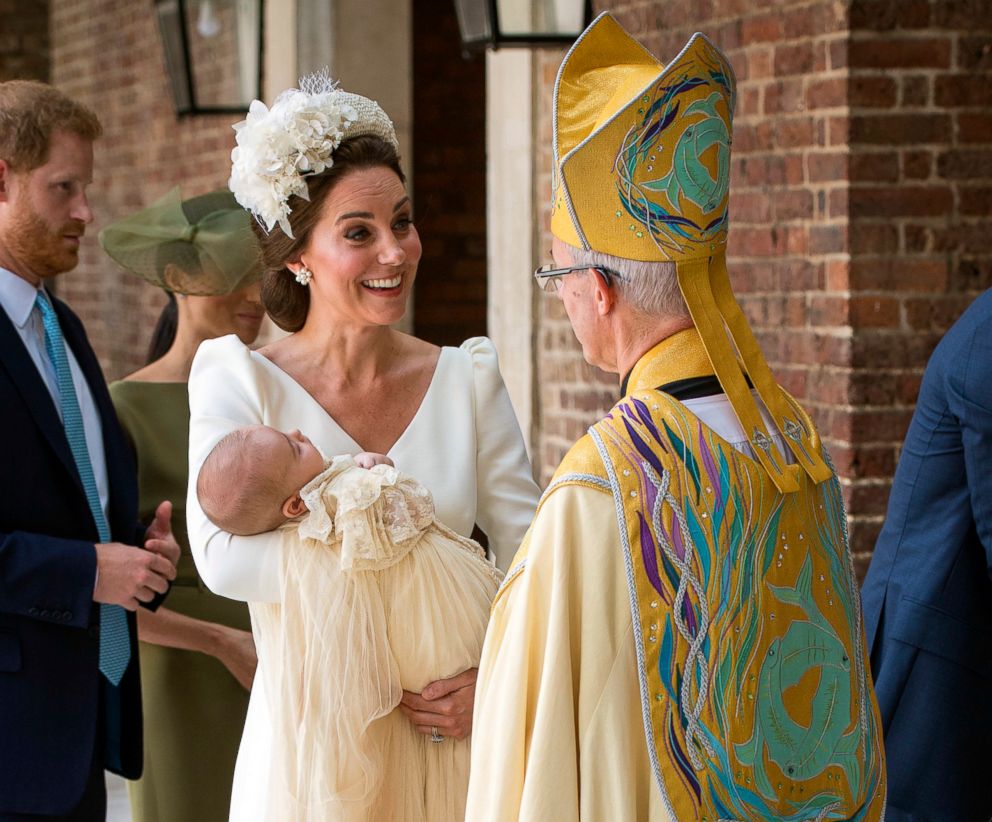 PHOTO: Kate, Duchess of Cambridge speaks to Archbishop of Canterbury Justin Welby as she arrives carrying Prince Louis for his christening service at the Chapel Royal, St James's Palace, London, July 9, 2018.