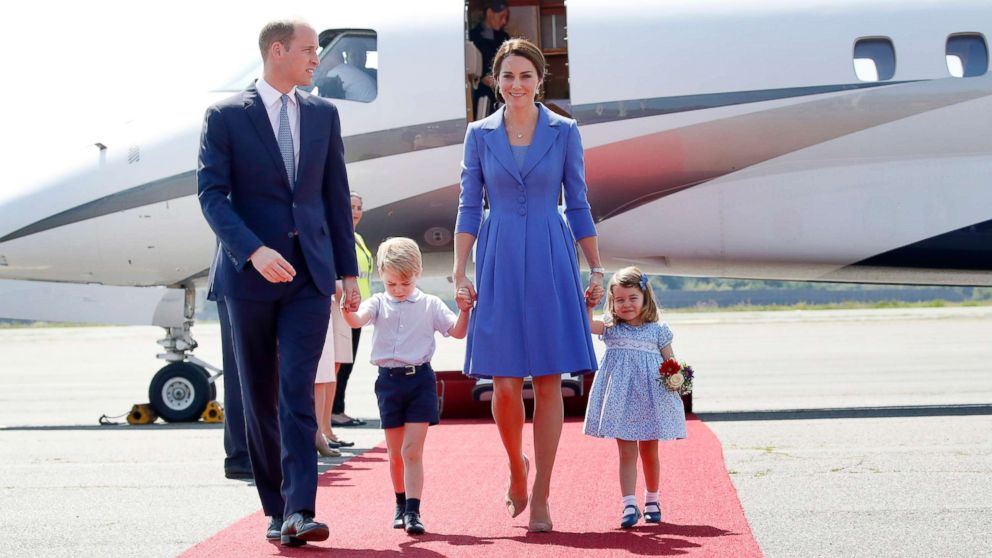 PHOTO: Prince William, Duke of Cambridge, Catherine, Duchess of Cambridge, Prince George of Cambridge and Princess Charlotte of Cambridge arrive at Berlin Tegel Airport during an official visit to Poland and Germany on July 19, 2017 in Berlin.