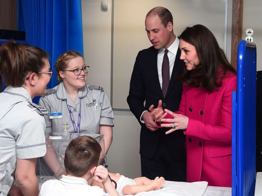 PHOTO: Prince William, Duke of Cambridge and Catherine, Duchess of Cambridge speak to staff as they visit Coventry University, Science and Health Building, Jan. 16, 2018, in Coventry, England.