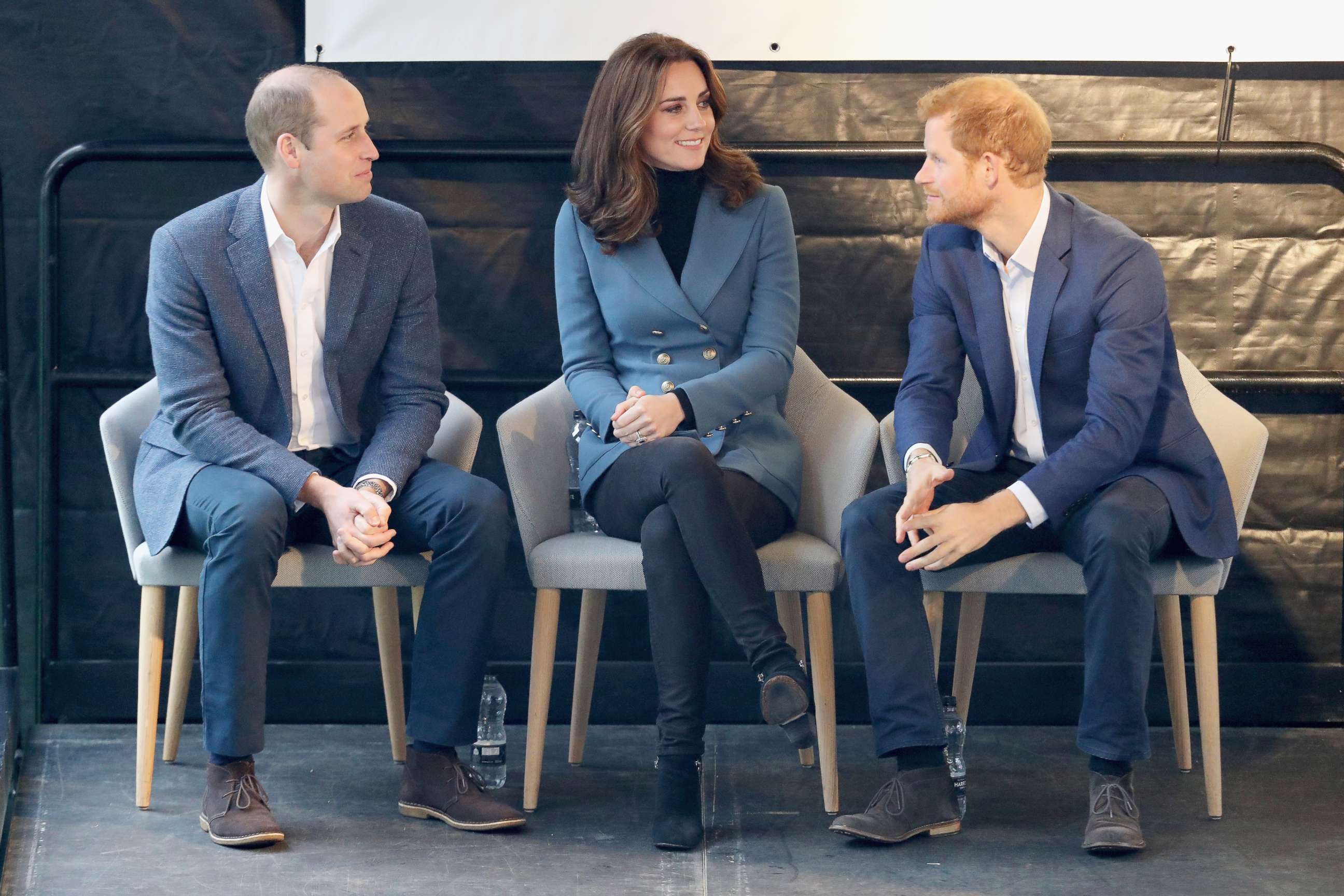 PHOTO: Prince William, Duke of Cambridge, Catherine, Duchess of Cambridge and Prince Harry attend the Coach Core graduation ceremony for more than 150 Coach Core apprentices at The London Stadium, Oct. 18, 2017, in London.