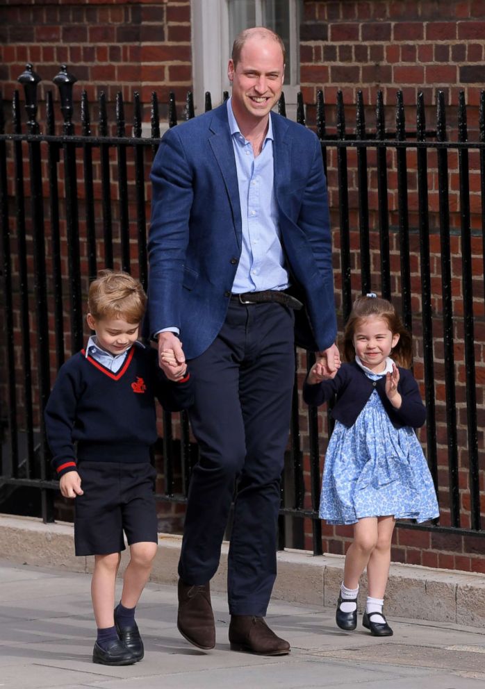PHOTO: Prince William returns to the Lindo Wing with Prince George and Princess Charlotte as they enter to meet their brother for the first time
at St Mary's Hospital in London, April 23, 2018.