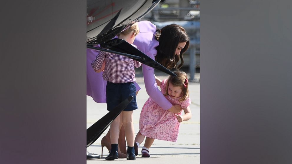 PHOTO: Kate the Duchess of Cambridge and her children Prince George and Princess Charlotte visit an Airbus helicopter on the tarmac of the Airbus compound in Hamburg, Germany, July 21,2017.
