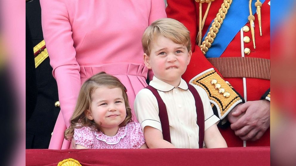 PHOTO: Princess Charlotte of Cambridge and Prince George of Cambridge look on from the balcony during the annual Trooping The Colour parade at the Mall, June 17, 2017, in London.