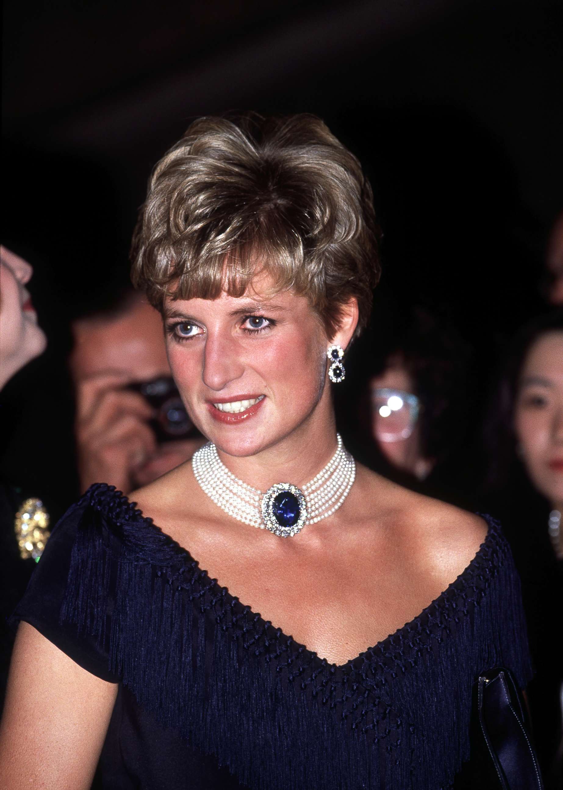 PHOTO: Diana, Princess of Wales, visits the National Arts Centre in Ottawa, October 1991. She is wearing a pearl and sapphire choker. 