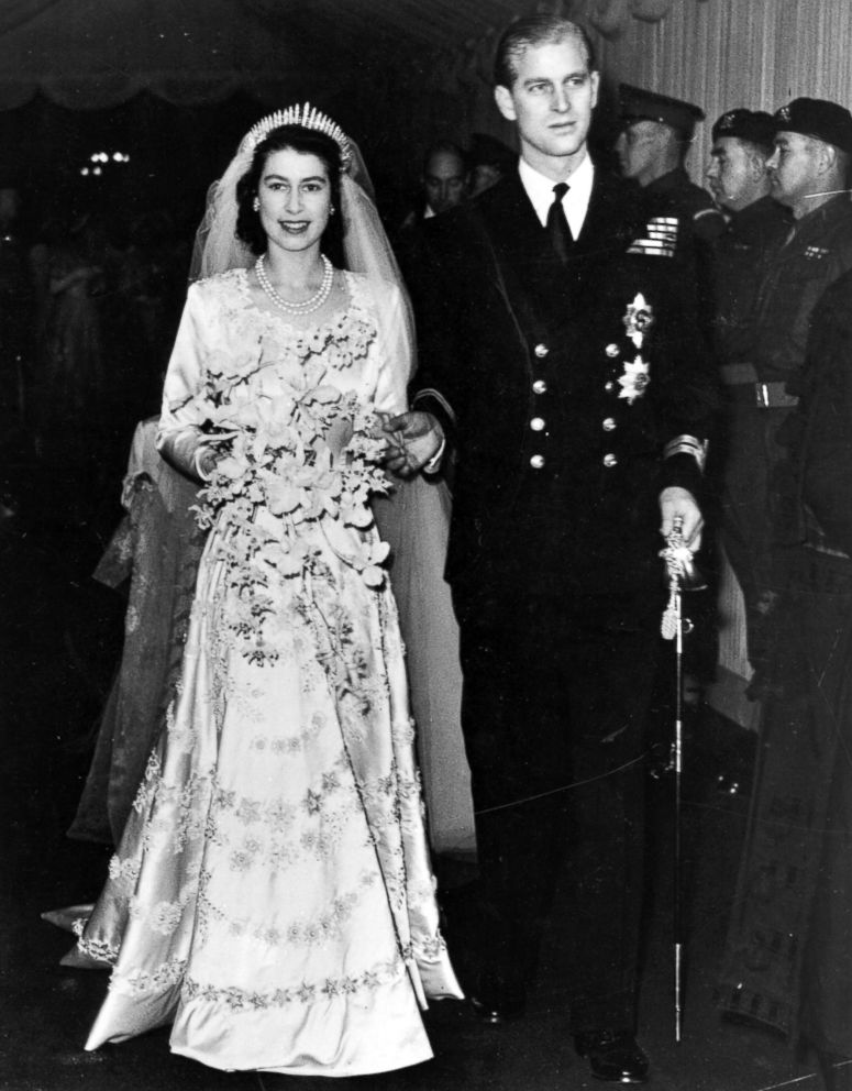 PHOTO: Queen Elizabeth II, as Princess Elizabeth, and her husband the Duke of Edinburgh, styled Prince Philip in 1957, on their wedding day. She became queen on her father King George VI's death in 1952.  