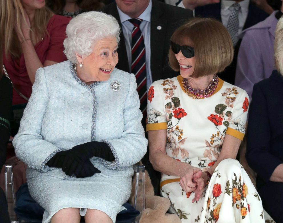 PHOTO: Queen Elizabeth II, accompanied by Anna Wintour, views British designer Richard Quinn's runway show during her visit to London Fashion Week's BFC Show Space in central London, Feb. 20, 2018.