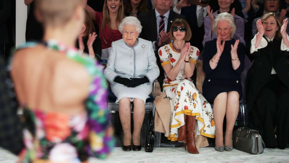 PHOTO: Queen Elizabeth II views British designer Richard Quinn's runway show before presenting him with the inaugural Queen Elizabeth II Award for British Design, during her visit to London Fashion Week's BFC Show Space in central London, Feb. 20, 2018. 